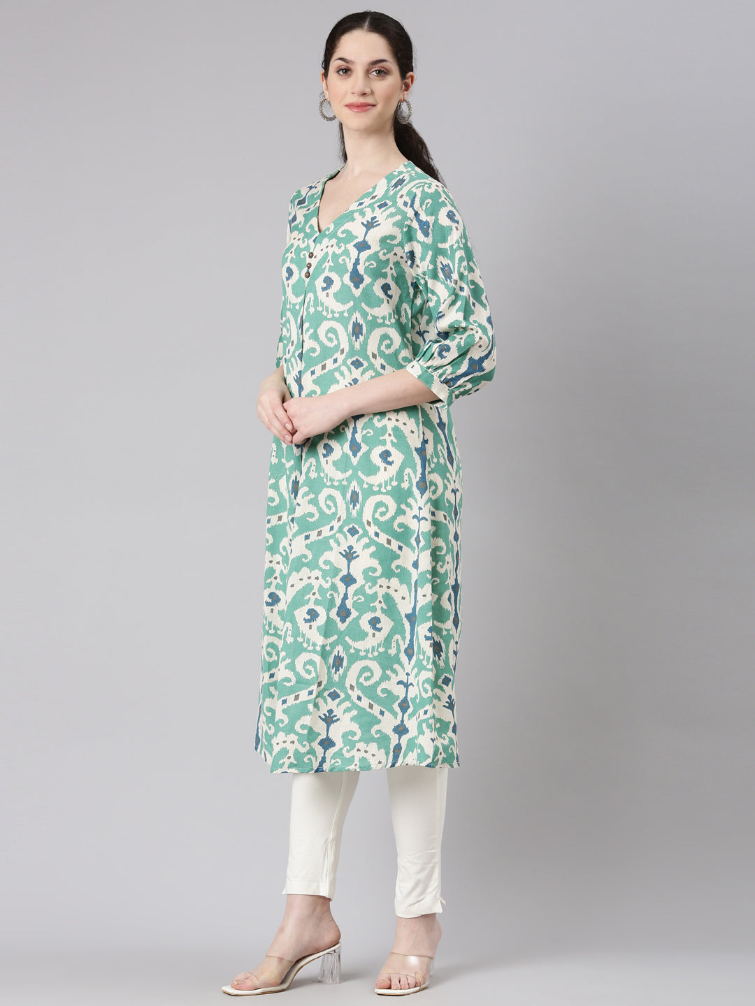 Neerus Green rayon printed curved kurti - back view