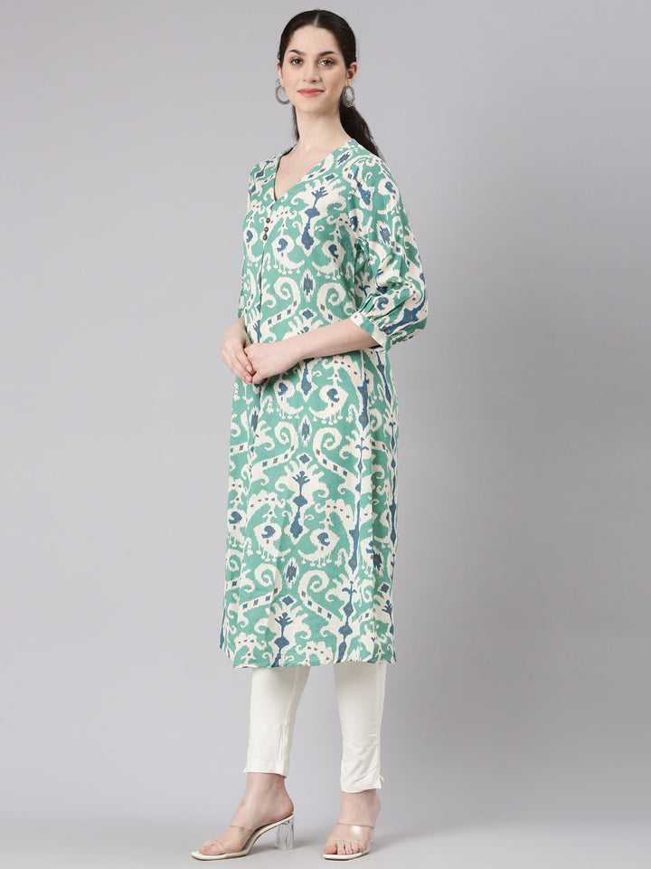 Neerus Green rayon printed curved kurti - back view