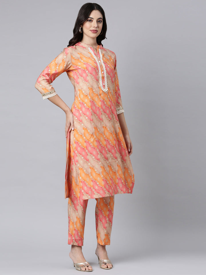 Neerus Orange muslin printed kurta set with trousers - back view