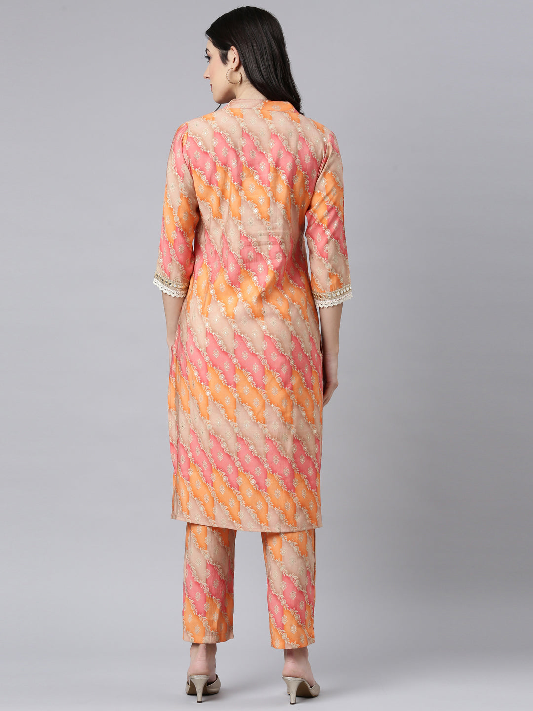 Neerus Orange muslin printed kurta set with trousers - side view
