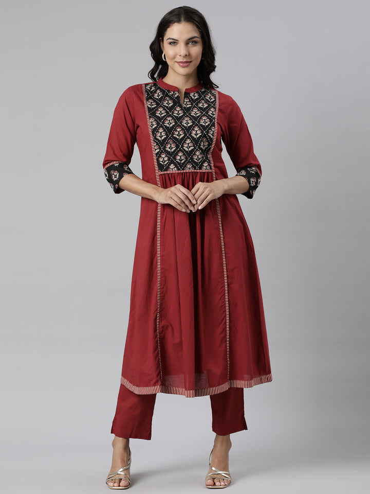 Neerus Maroon printed panelled kurta set - front view