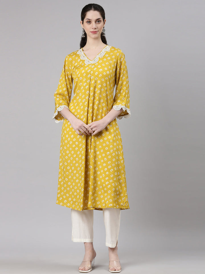 Neerus Yellow modal solid kurta set with trouser - front view