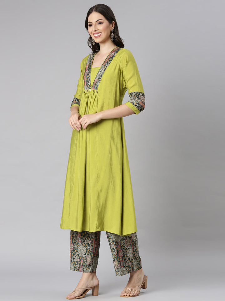 Neerus Yellow cotton solid kurta set with palazzo - back view