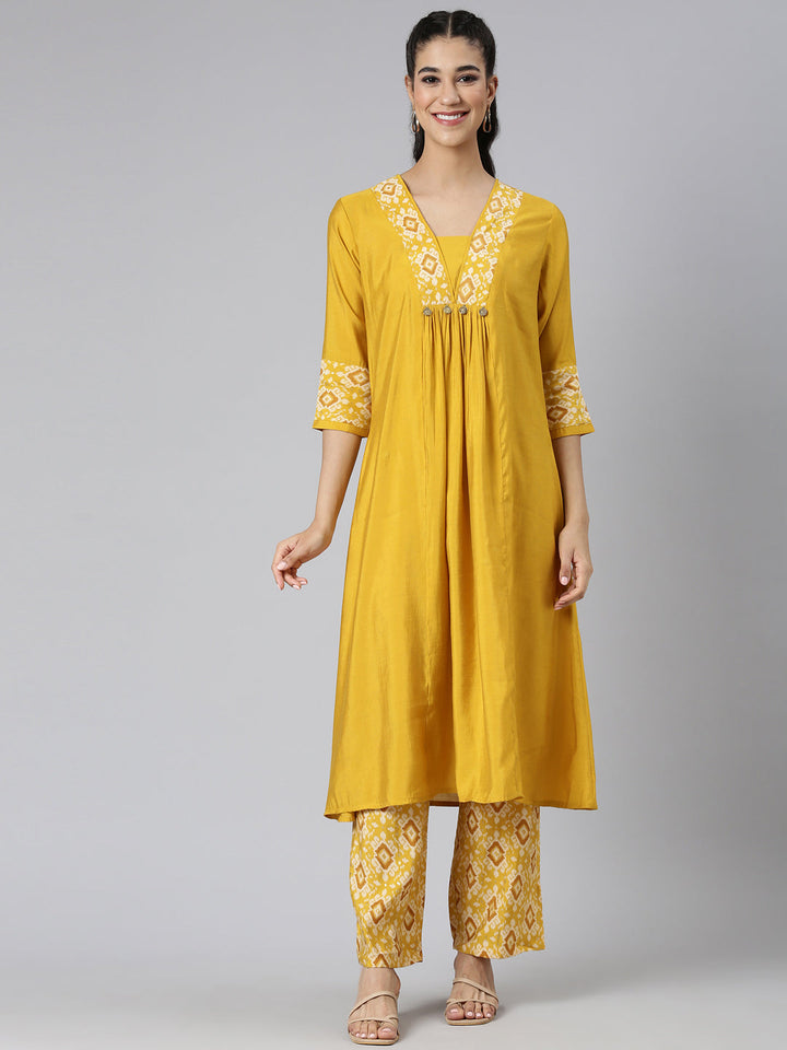 Neerus Yellow cotton solid kurta set - front view