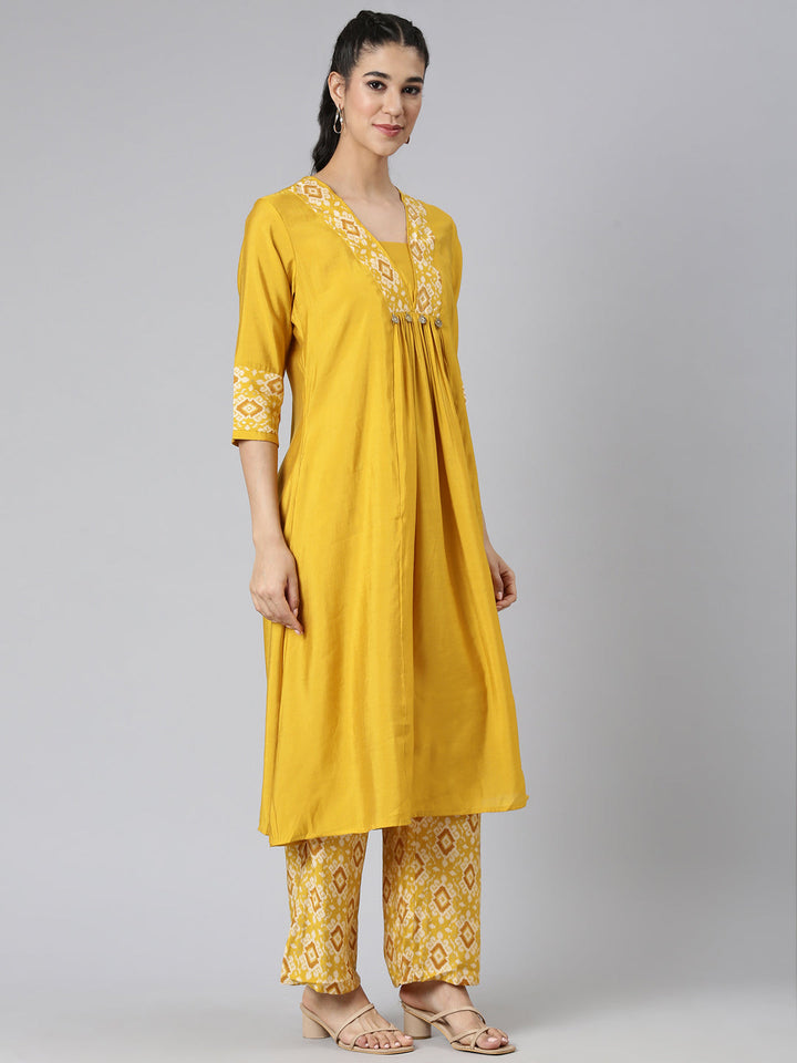 Neerus Yellow cotton solid kurta set - back view
