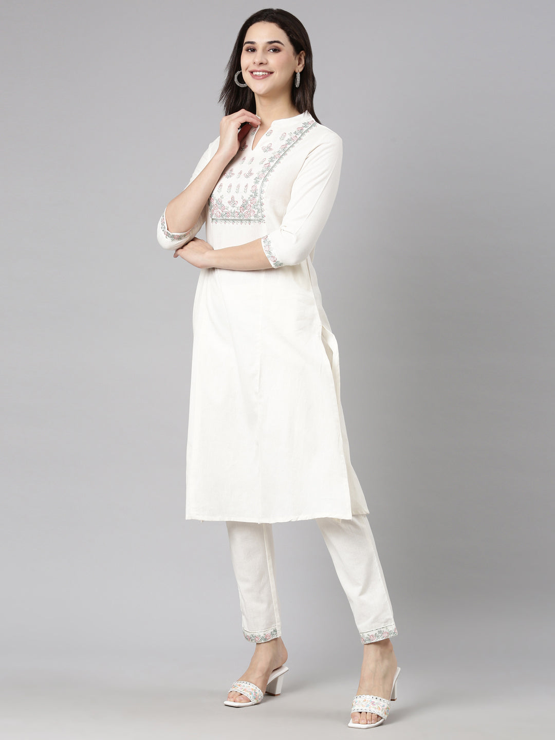 Neerus Beige solid straight kurta set with trousers - back view