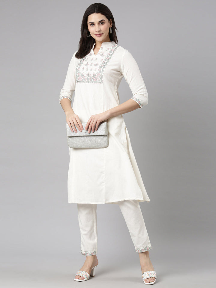Neerus Beige solid straight kurta set with trousers - detail view 1