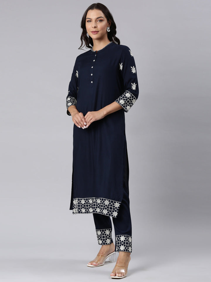 Neerus Blue cotton panelled straight kurta set - back view