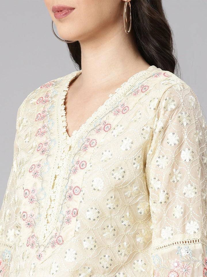 Neerus Cream Self Design Straight Kurta and Trousers With Dupatta