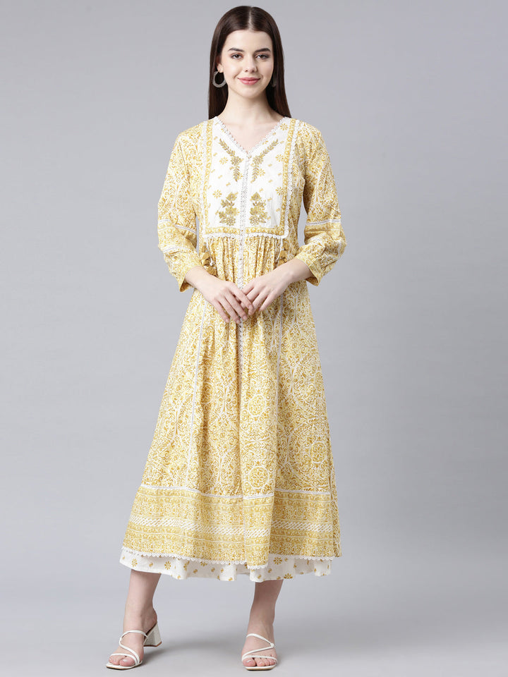 Neerus Yellow cotton printed floral straight kurta - front view