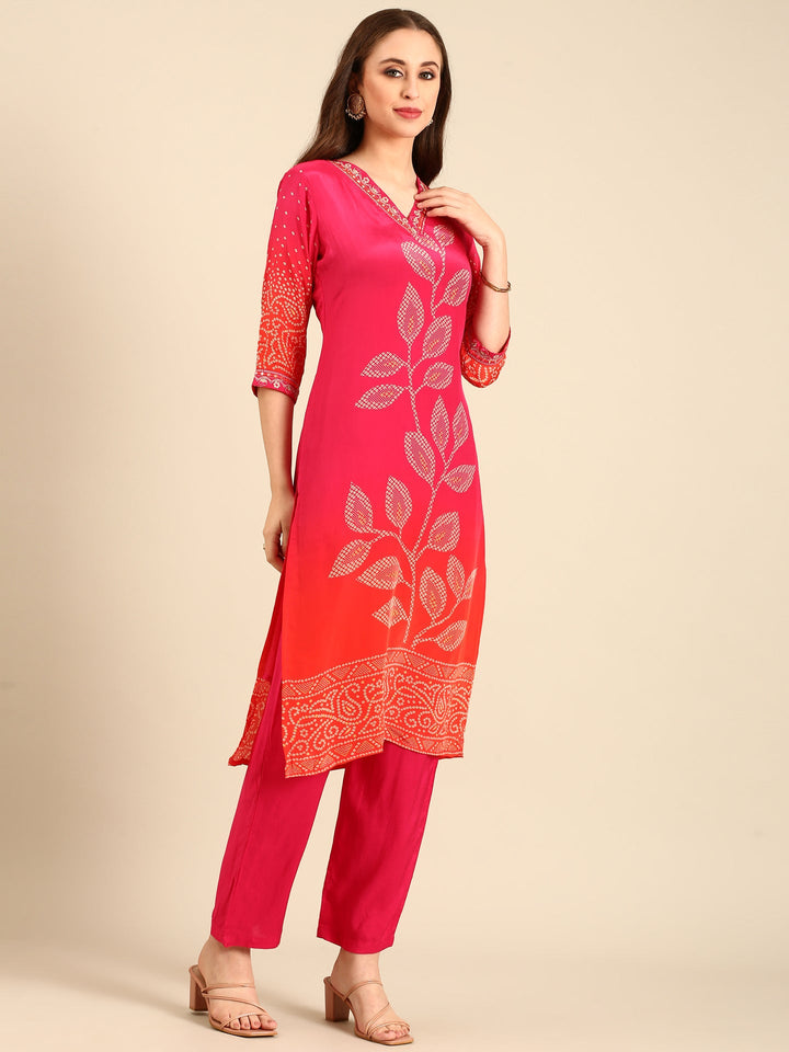Neerus Red crepe mirror work bandhani suit set - back view