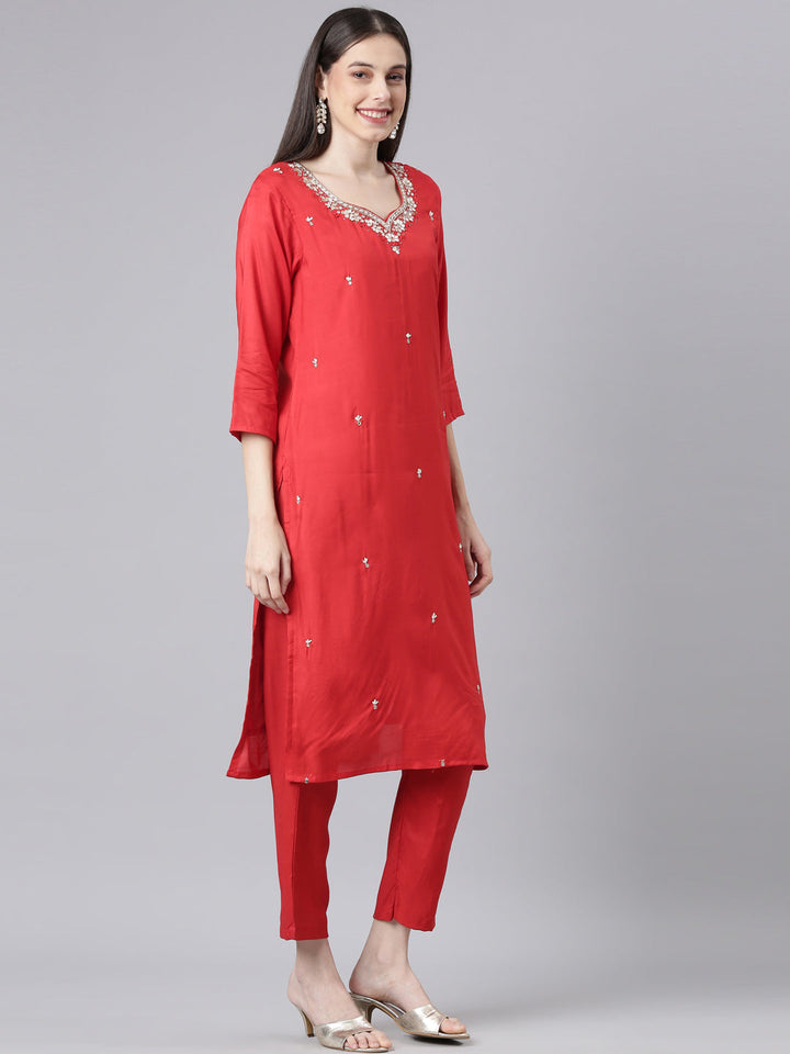 Neerus Red Solid Straight Kurta and Trousers With Dupatta