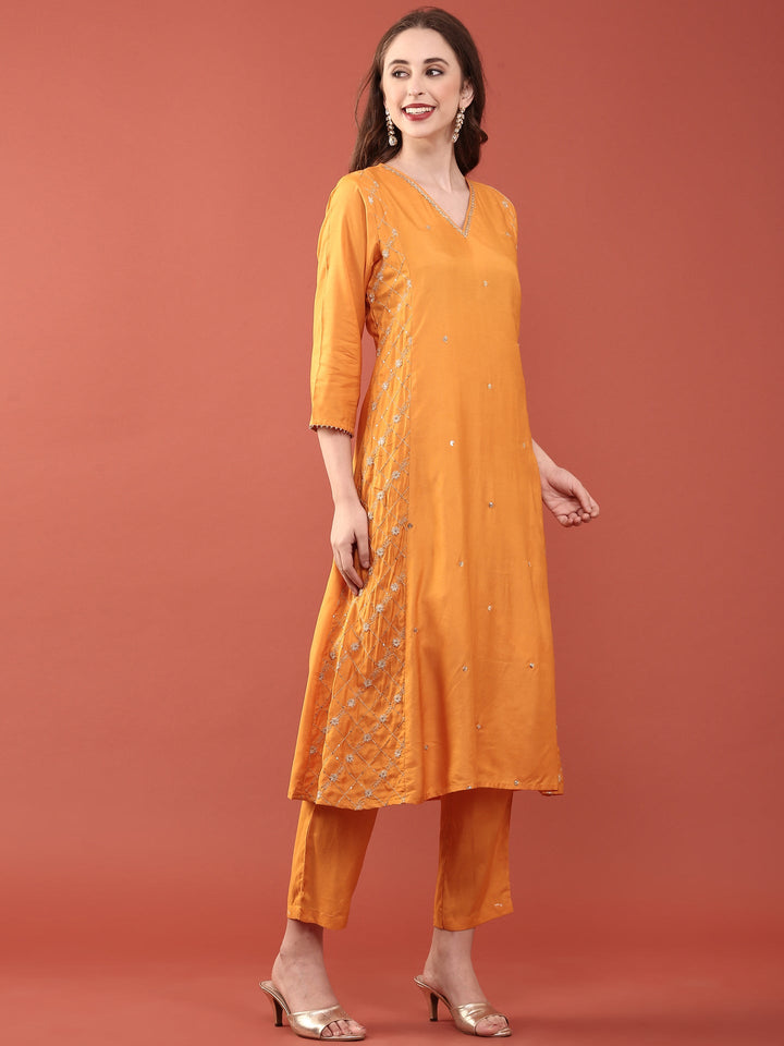 Neerus Orange muslin solid suit set - back view