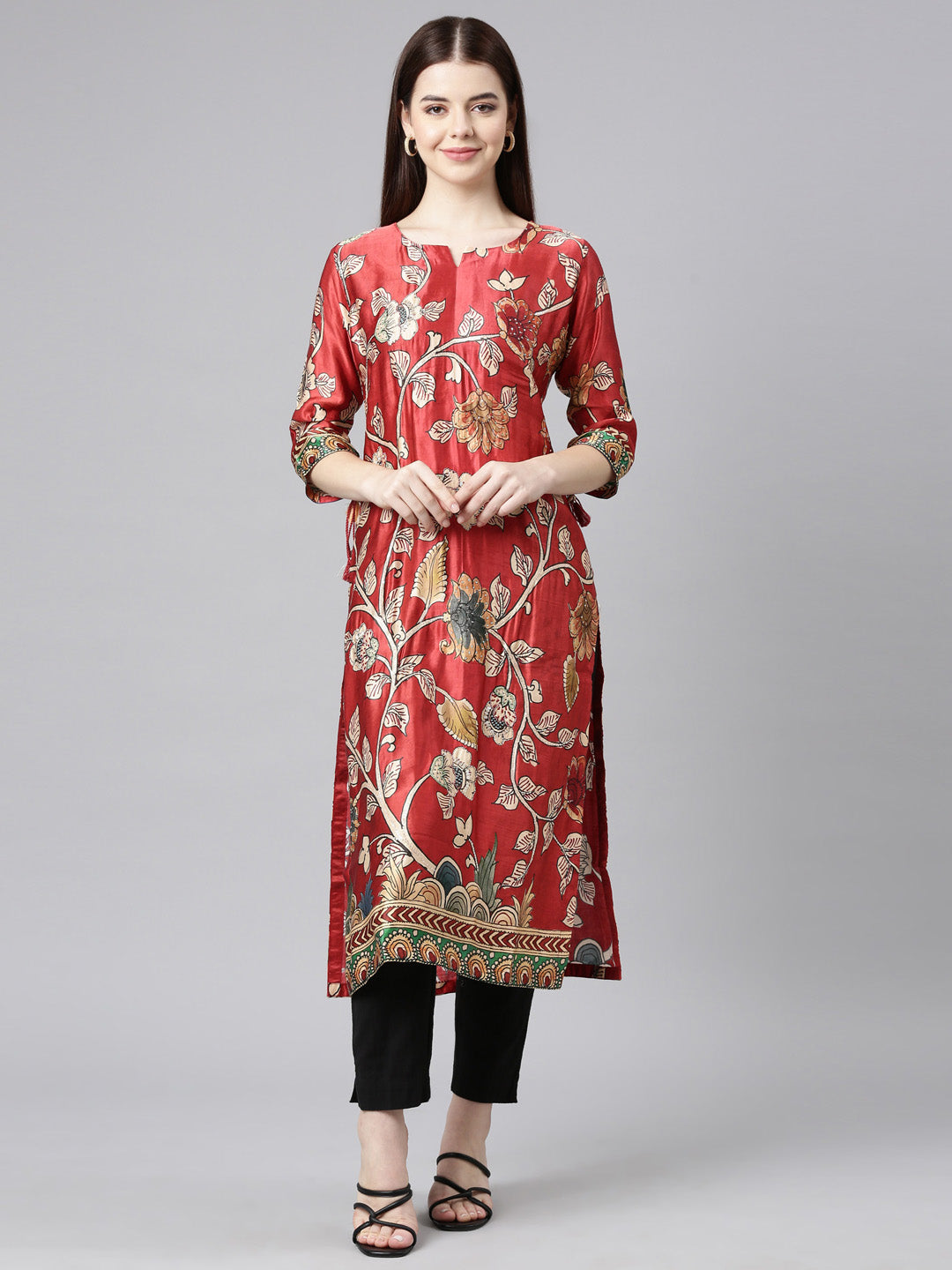Neerus Orange printed floral straight kurta - front view