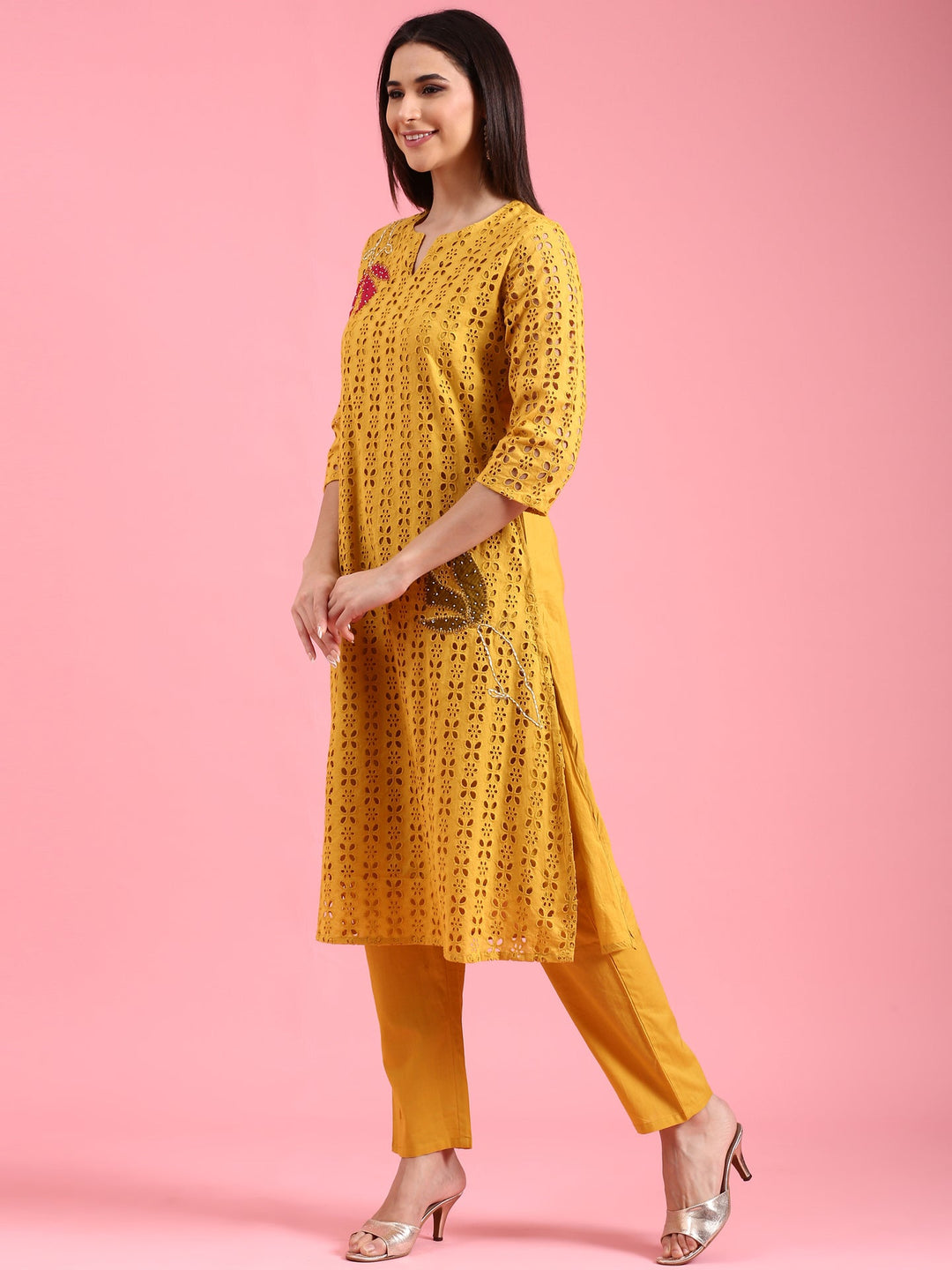 Neerus Yellow cotton chikankari kurta set - back view