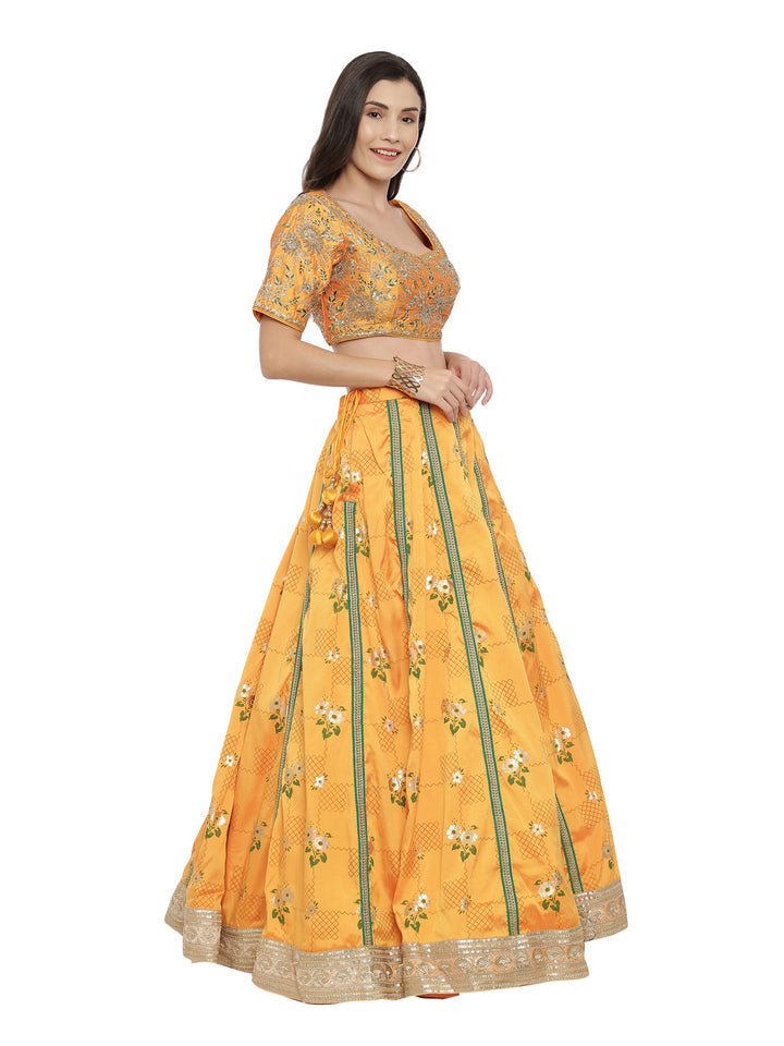 Neerus Yellow silk embellished lehenga set - side view