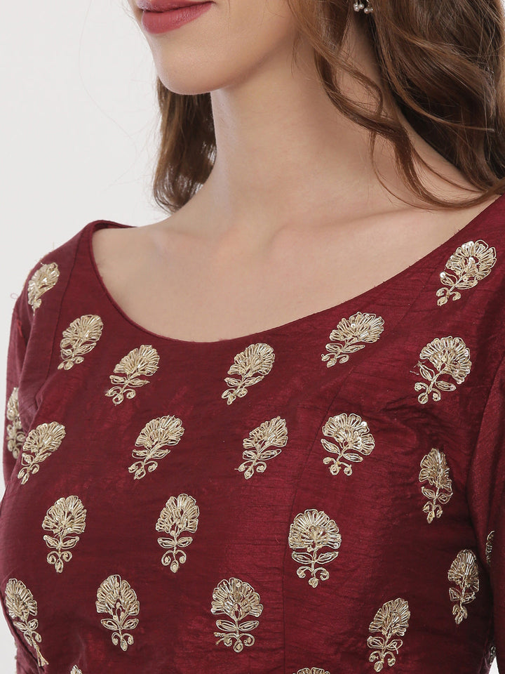 Neerus Maroon silk embellished lehenga set - side view
