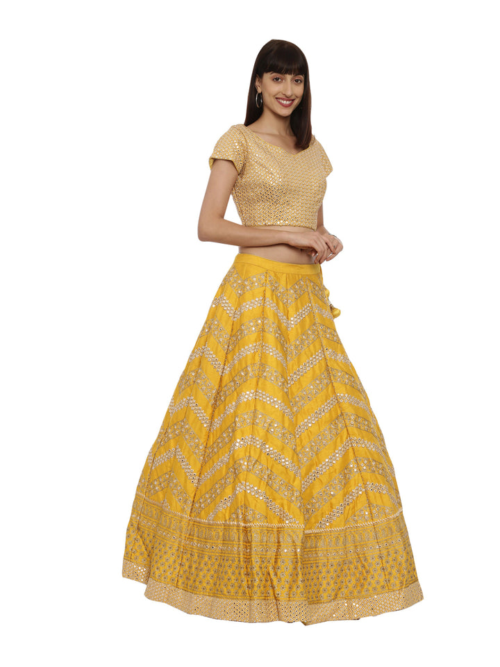 Neerus Yellow silk embellished lehenga set - side view
