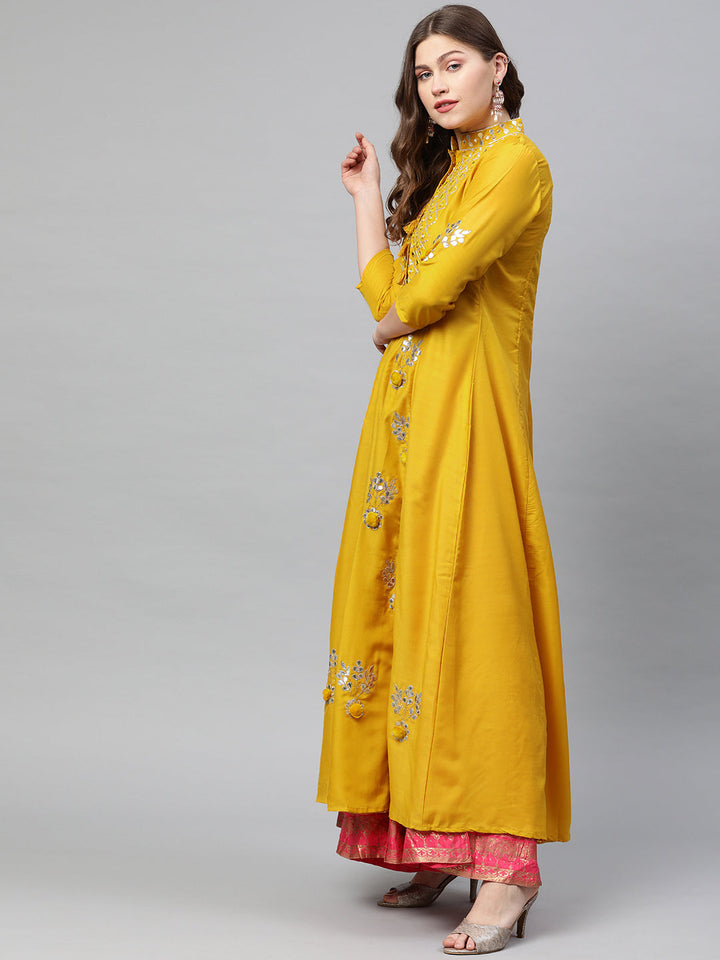Neerus Yellow muslin embellished A-line kurta - side view