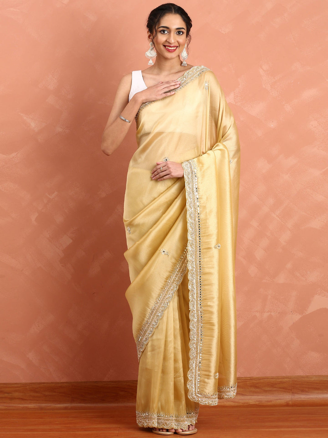 Neerus Yellow tissue embellished saree with mirror work - back view