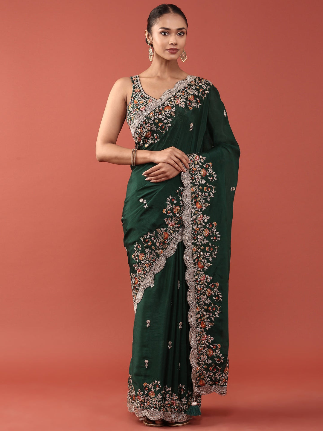 Neerus Green crepe embroidered saree with blouse - front view
