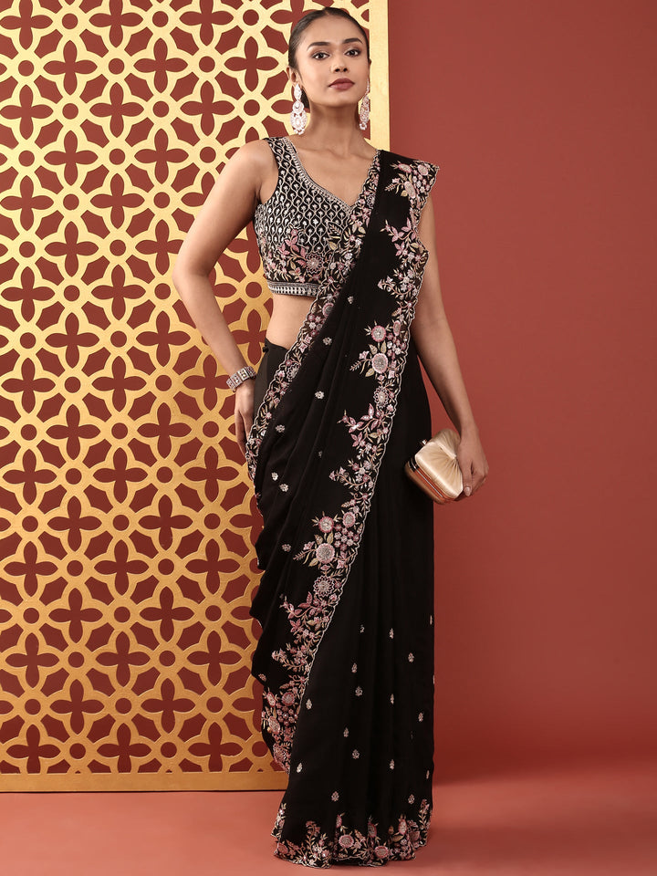Neerus Black crepe embroidered saree with readymade blouse - front view