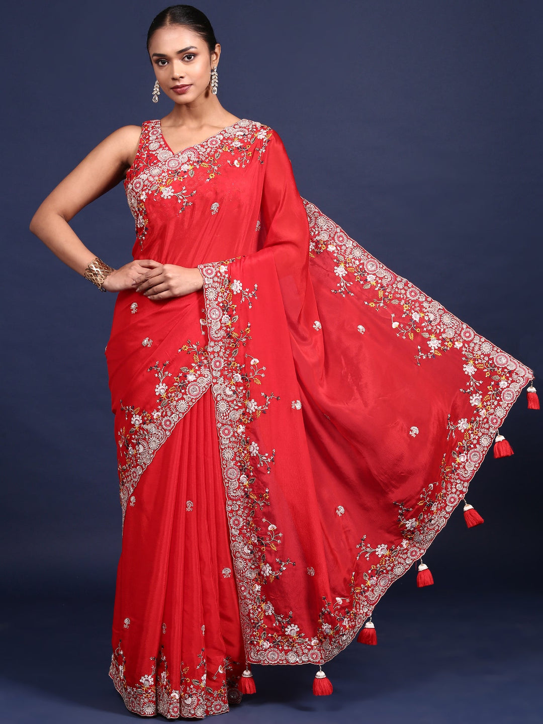 Neerus Red crepe embroidered saree with blouse - front view