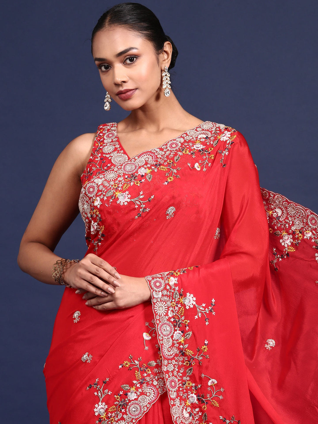 Neerus Red crepe embroidered saree with blouse - back view