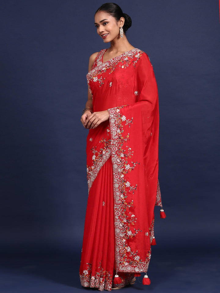 Neerus Red crepe embroidered saree with blouse - side view