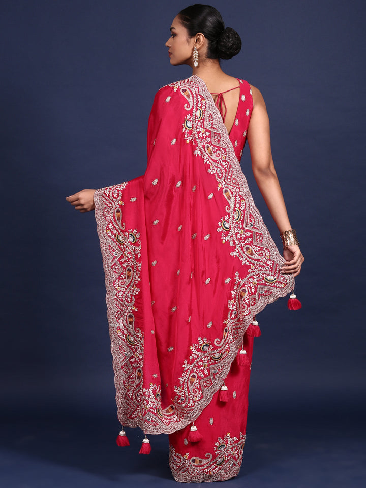 Neerus Pink crepe embroidered saree with readymade blouse - side view