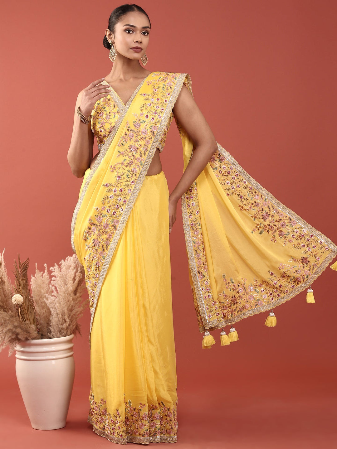 Neerus Yellow crepe embroidered saree with blouse - detail view 1