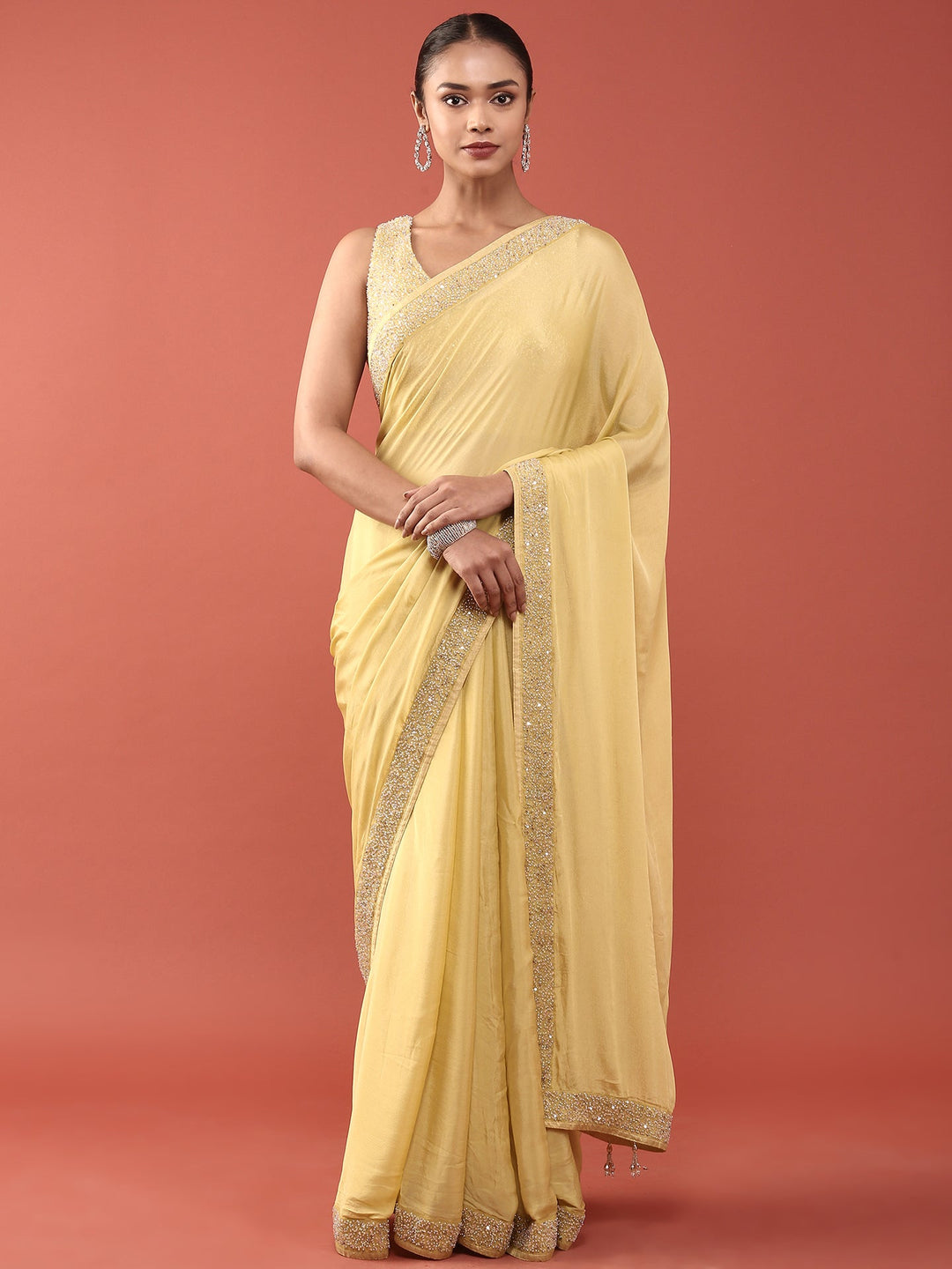 Neerus Green crepe embellished saree with readymade blouse - front view