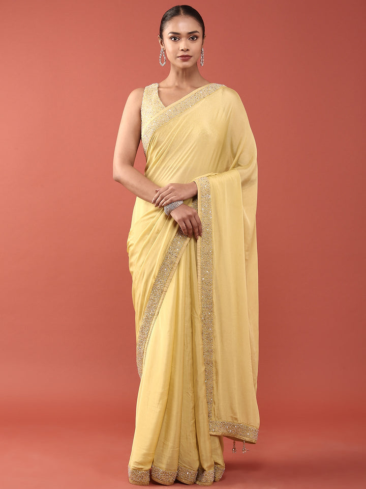 Neerus Green crepe embellished saree with readymade blouse - front view