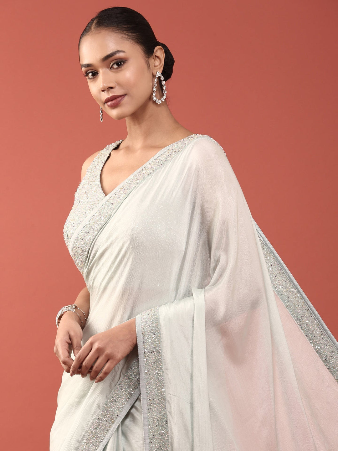 Neerus Blue crepe embellished saree with readymade blouse - back view