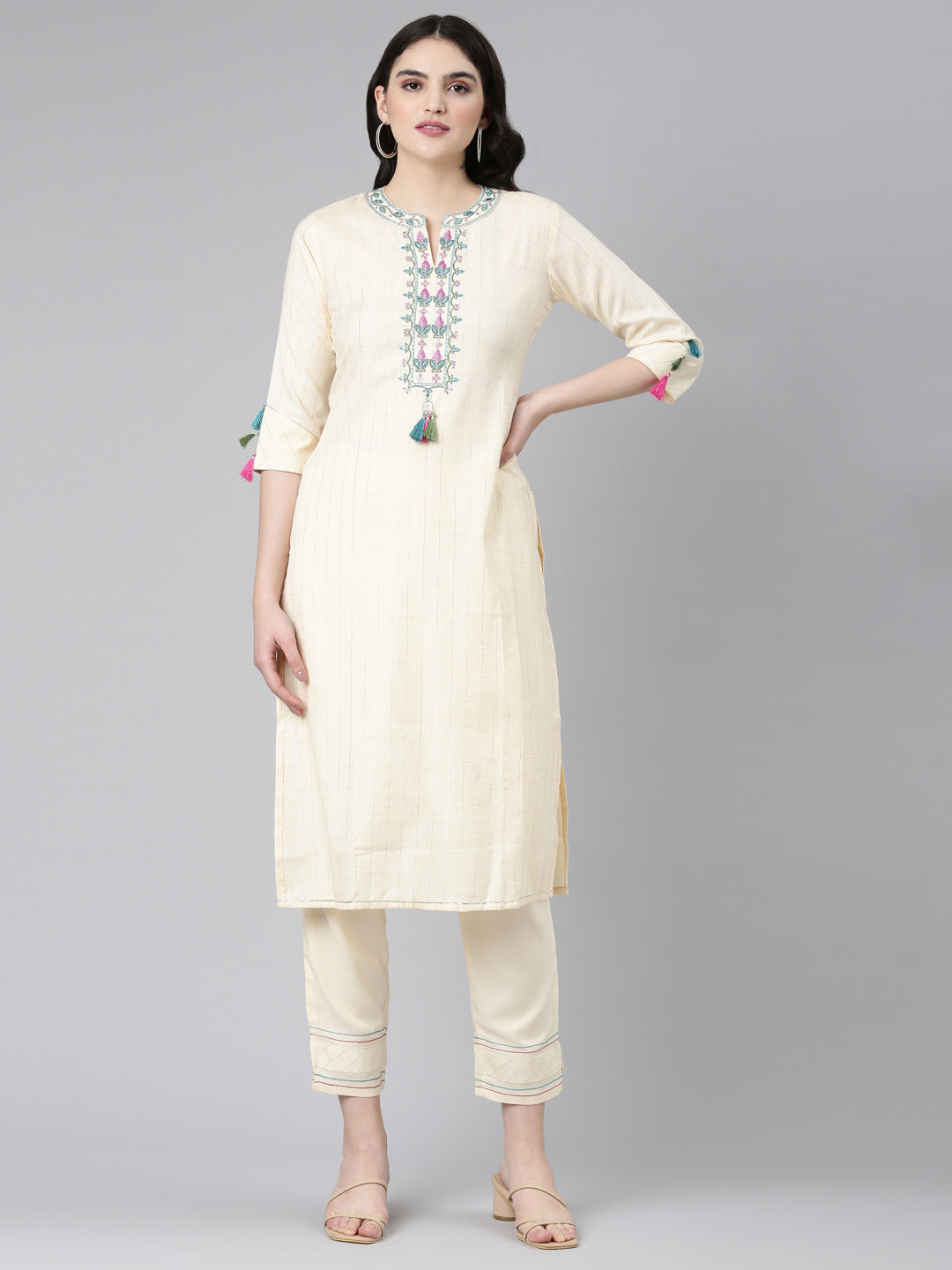Neerus Beige rayon solid kurta set - front view