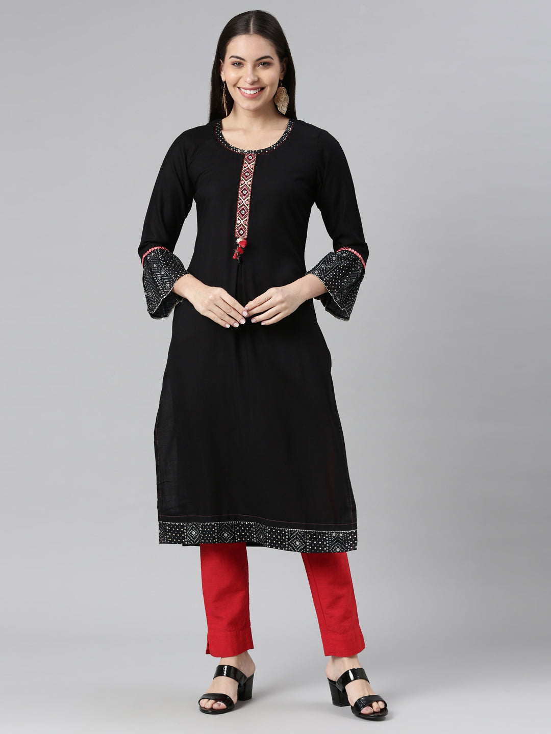 Neerus Black rayon solid kurti - front view