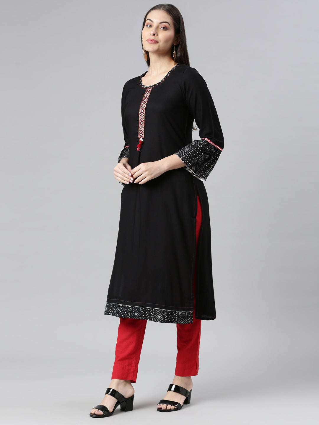Neerus Black rayon solid kurti - back view
