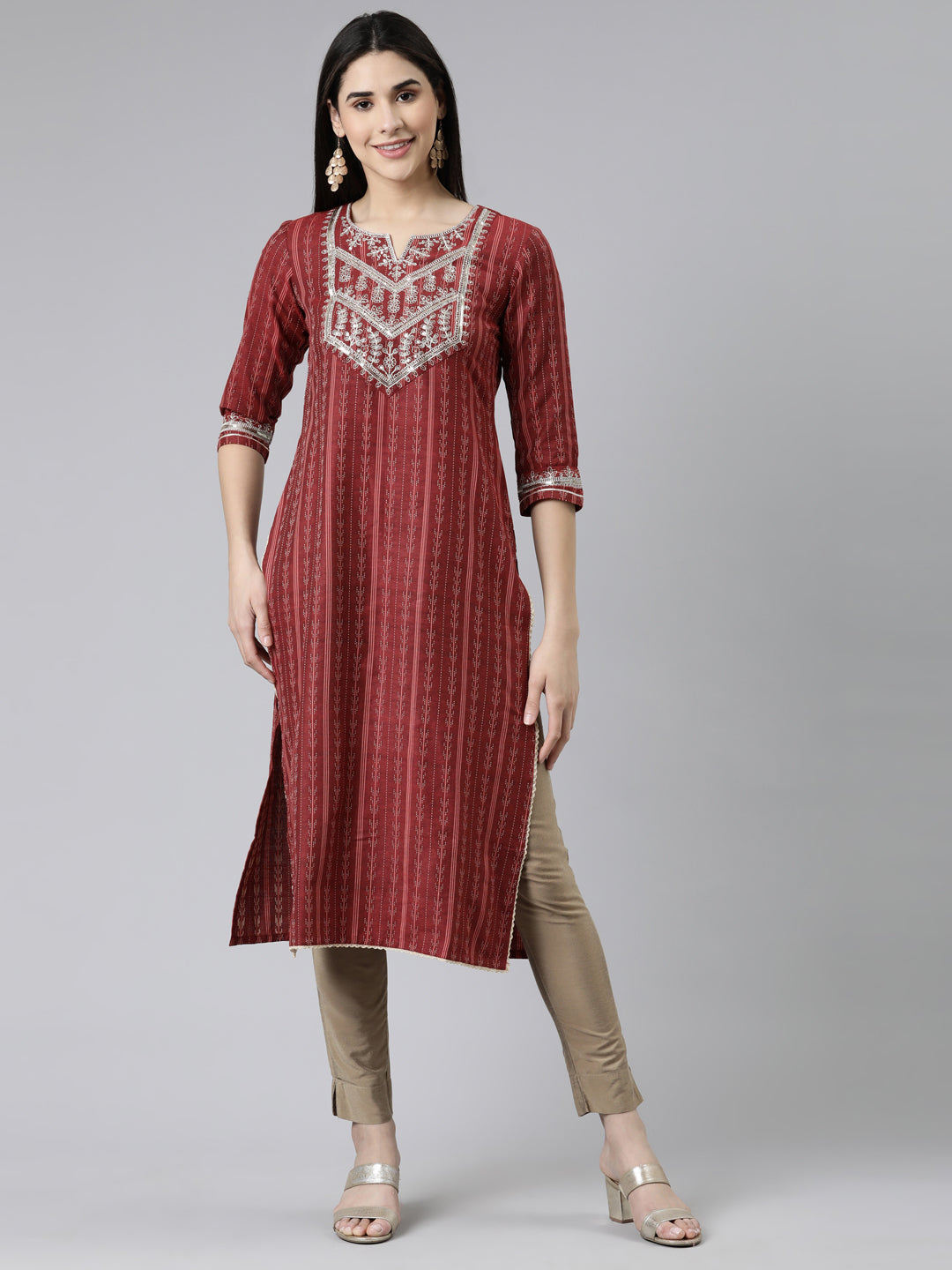 Neerus Maroon cotton solid straight kurti - front view
