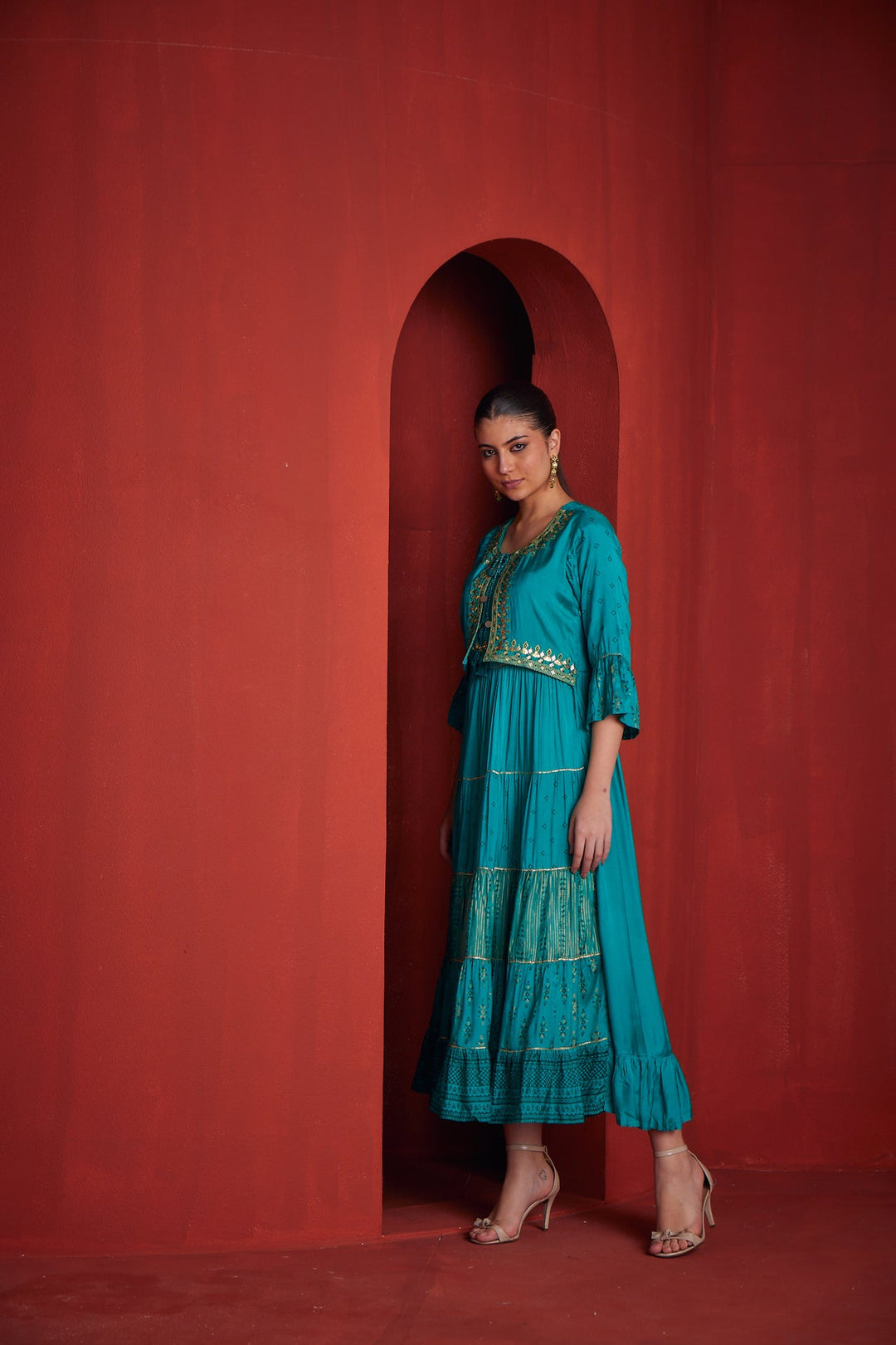 Neerus Green shantoon flared gown - back view