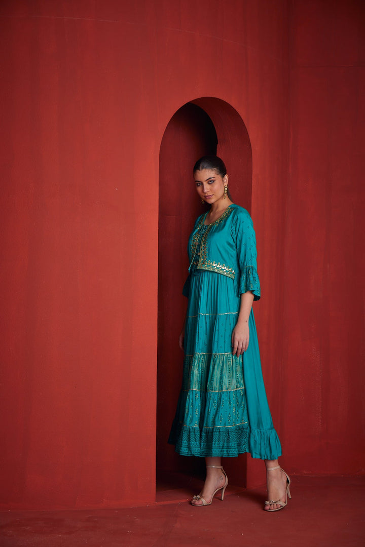 Neerus Green shantoon flared gown - back view