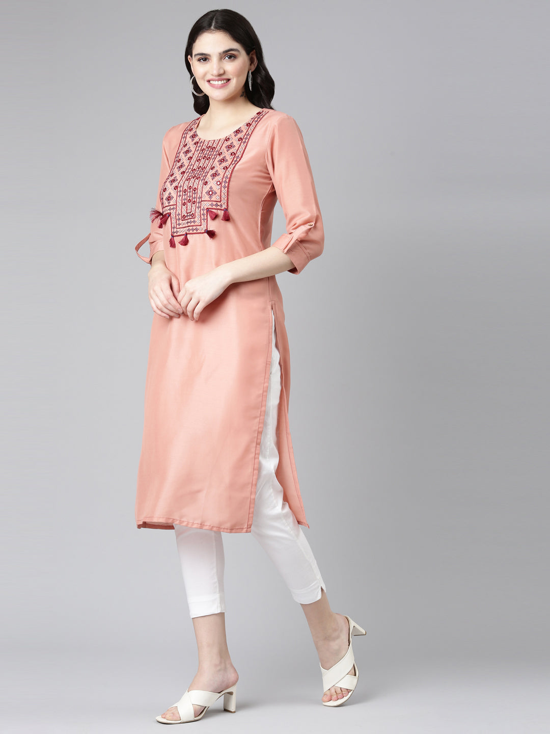 Neerus Orange muslin embroidered straight kurti - back view