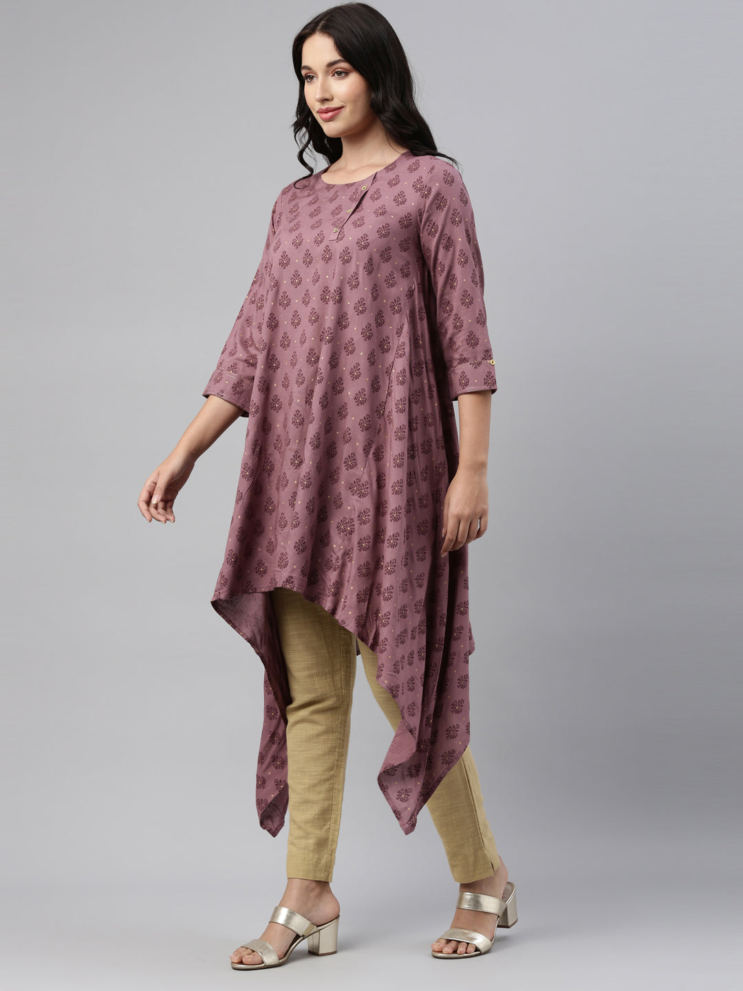 Neerus Pink cotton printed A-line kurti asymmetric hem - side view