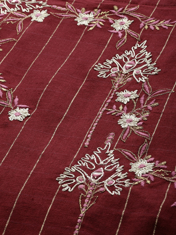 Neerus Maroon cotton embroidered flared kurta - back view