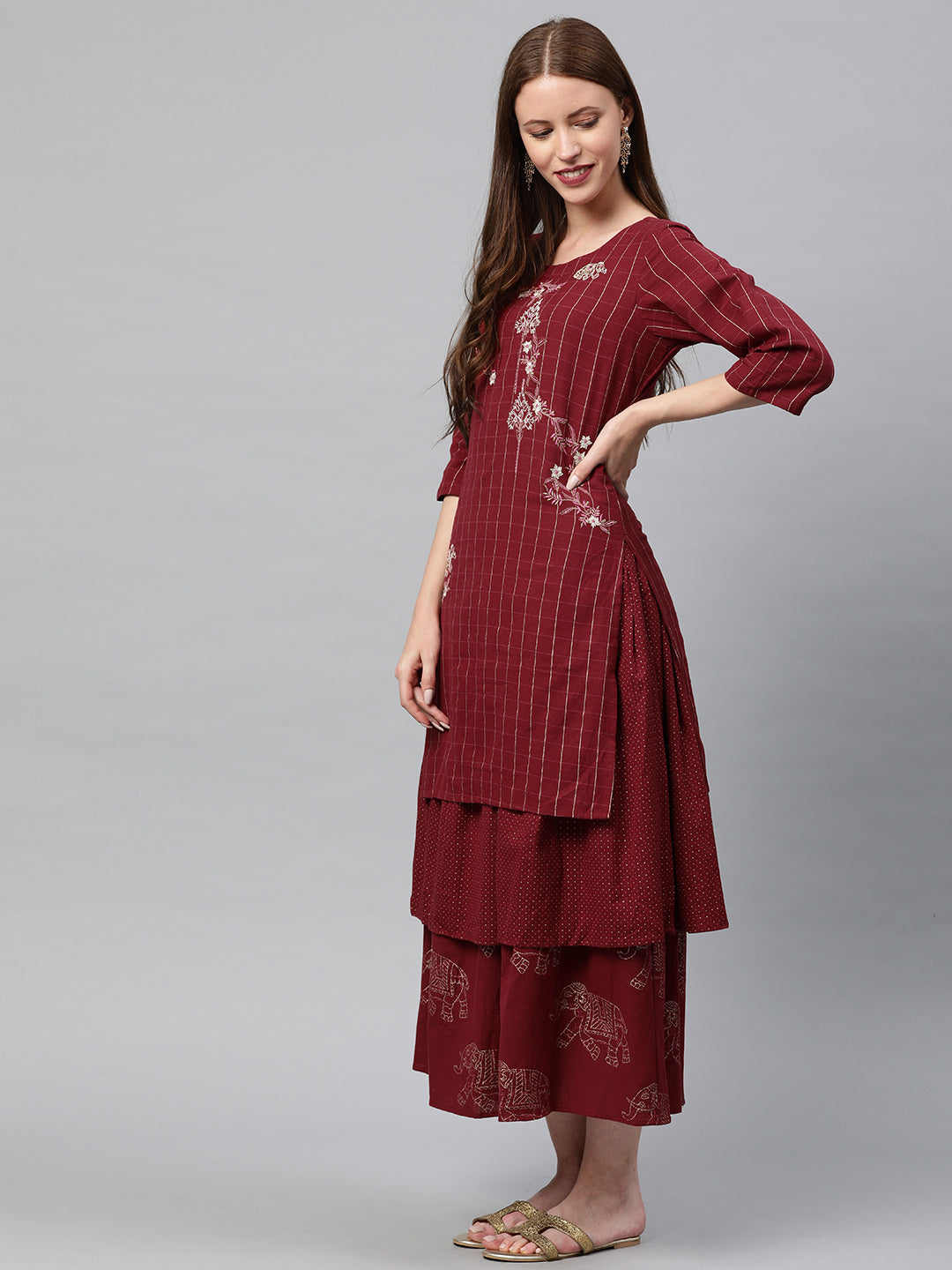 Neerus Maroon cotton embroidered flared kurta - side view