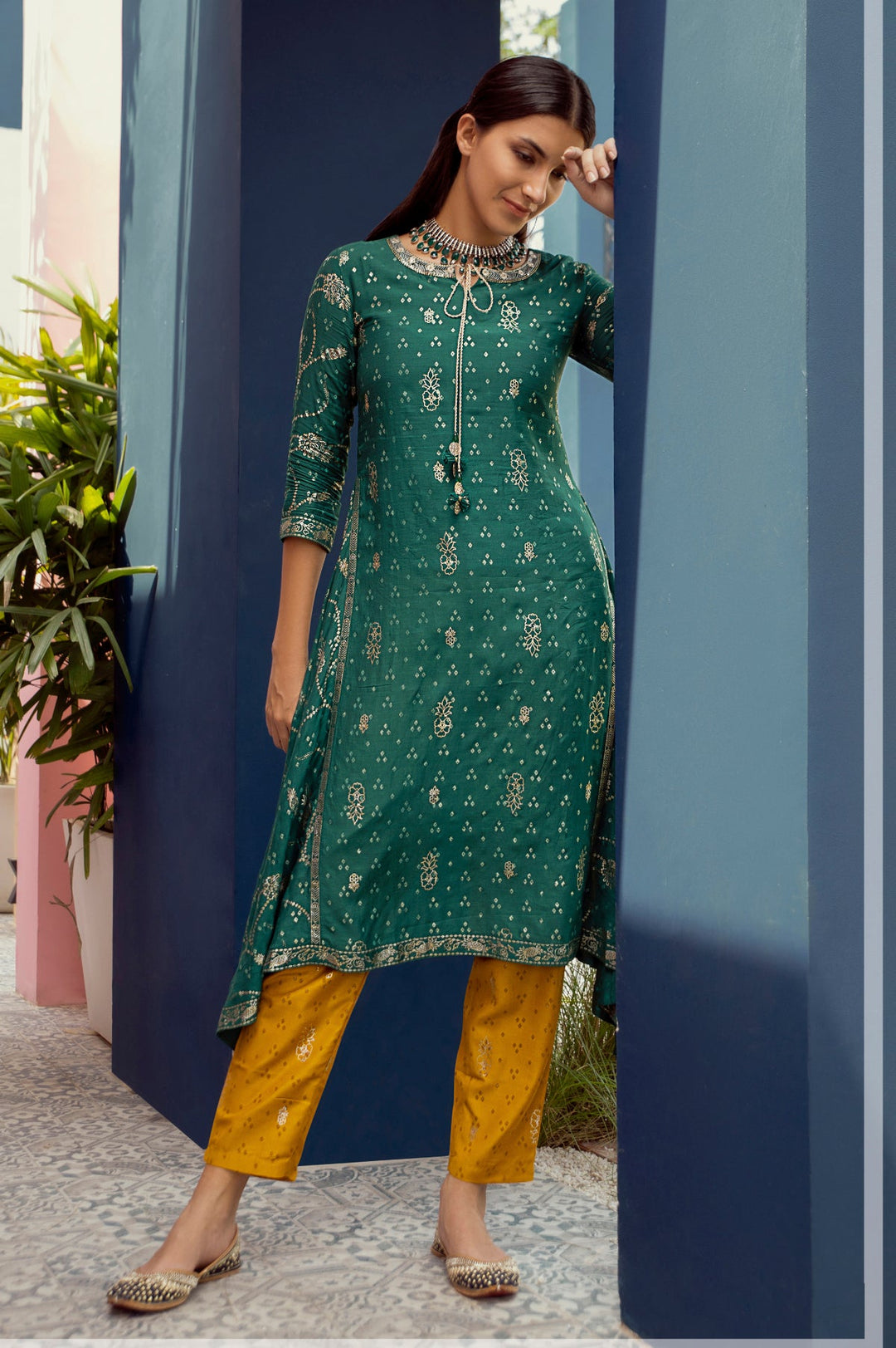 Neerus Green viscose rayon printed A-line kurti - front view