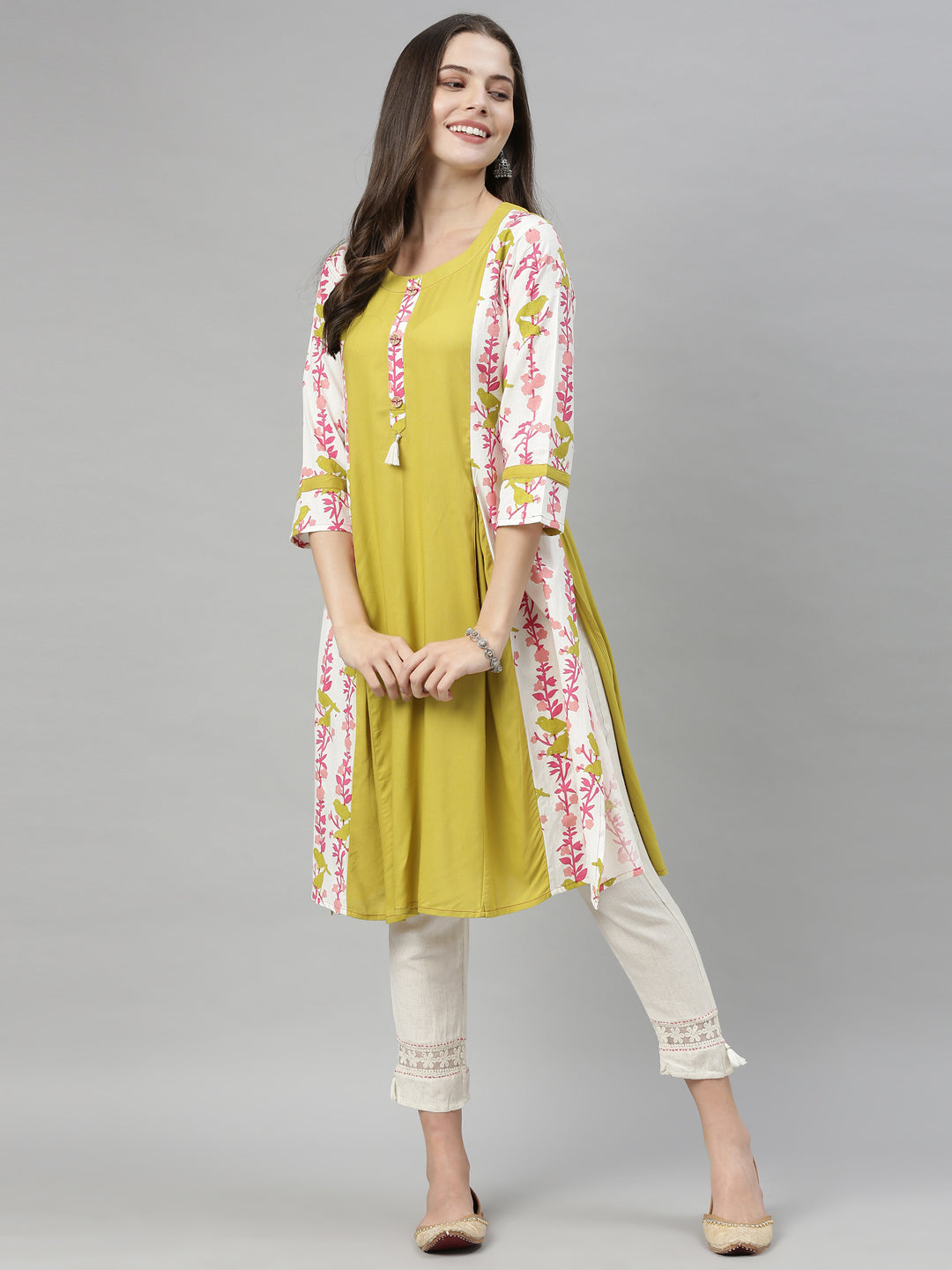 Neerus Green viscose rayon printed A-Line kurti - front view