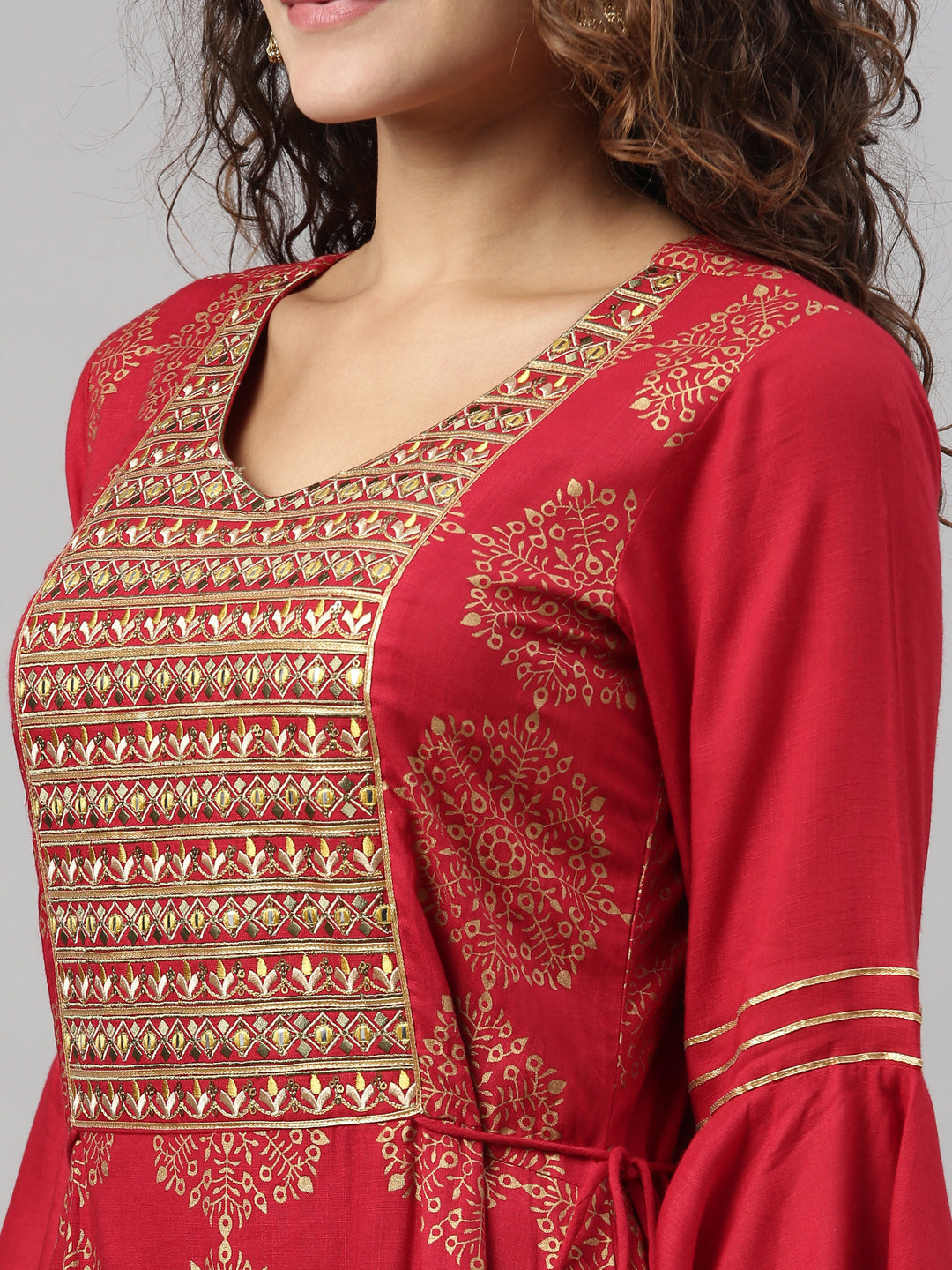 Neerus Maroon rayon printed kurti A-line - side view