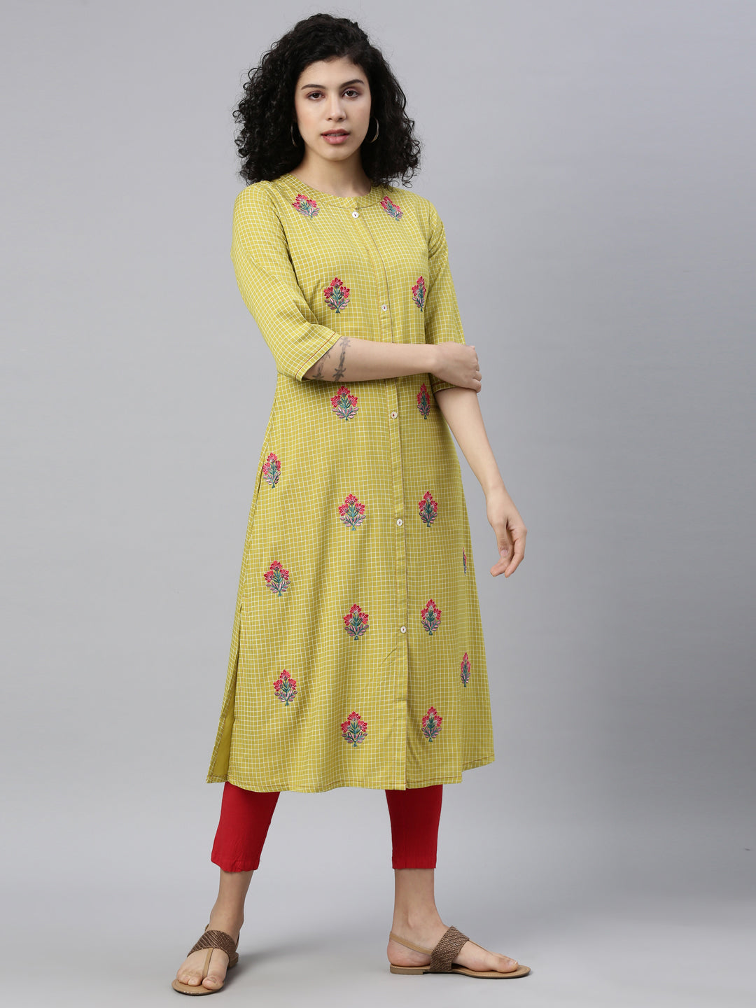 Neerus Green viscose rayon thread embroidered checked kurti - front view