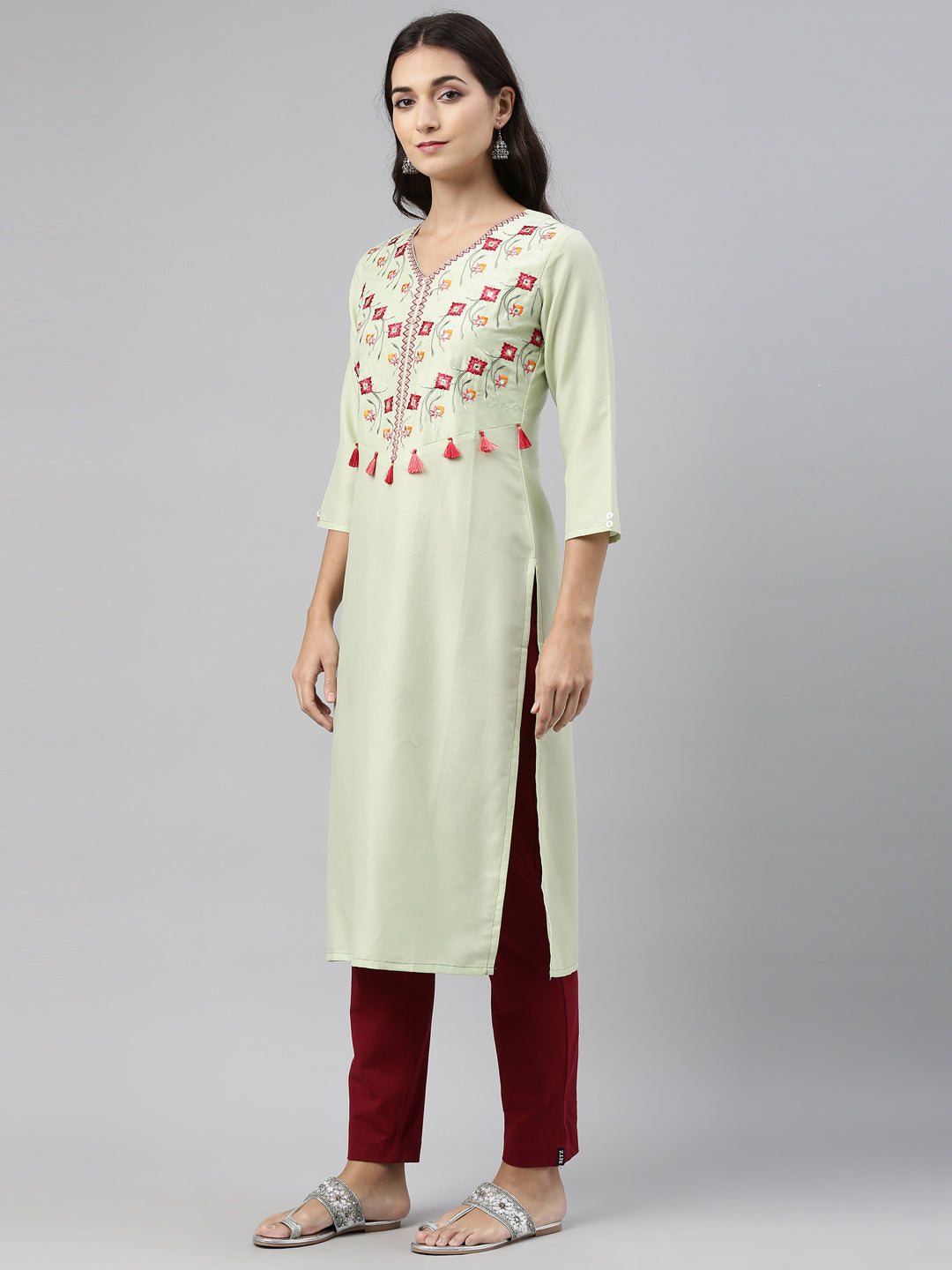 Neerus Green muslin embroidered kurti straight silhouette - back view