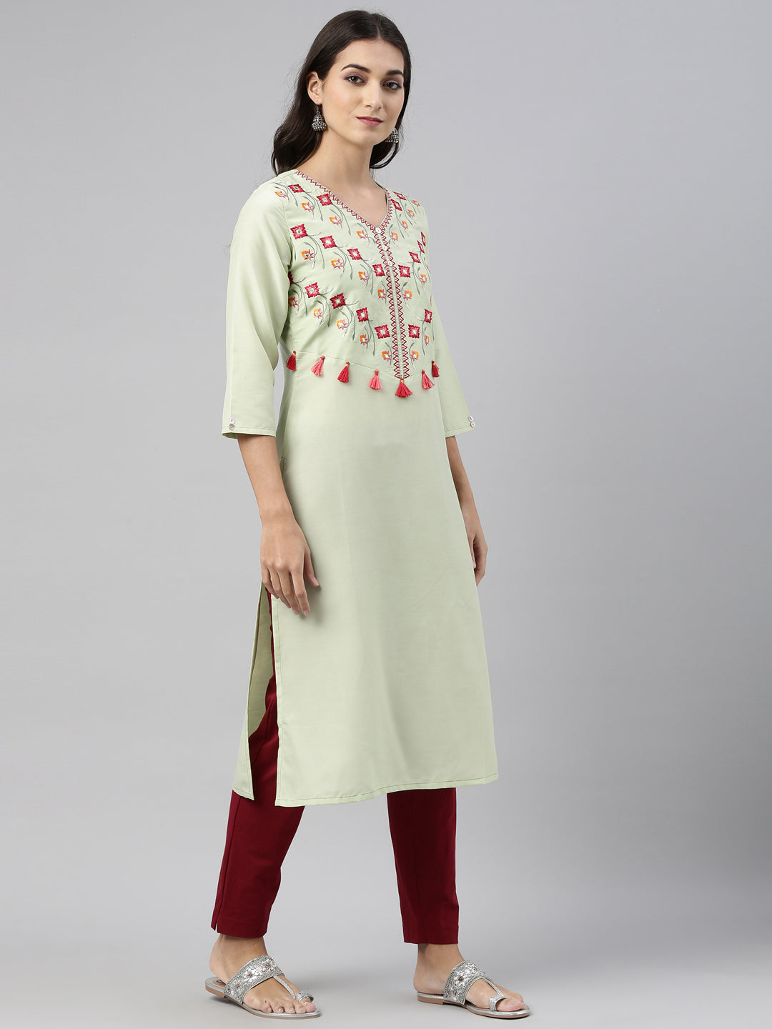 Neerus Green muslin embroidered kurti straight silhouette - side view
